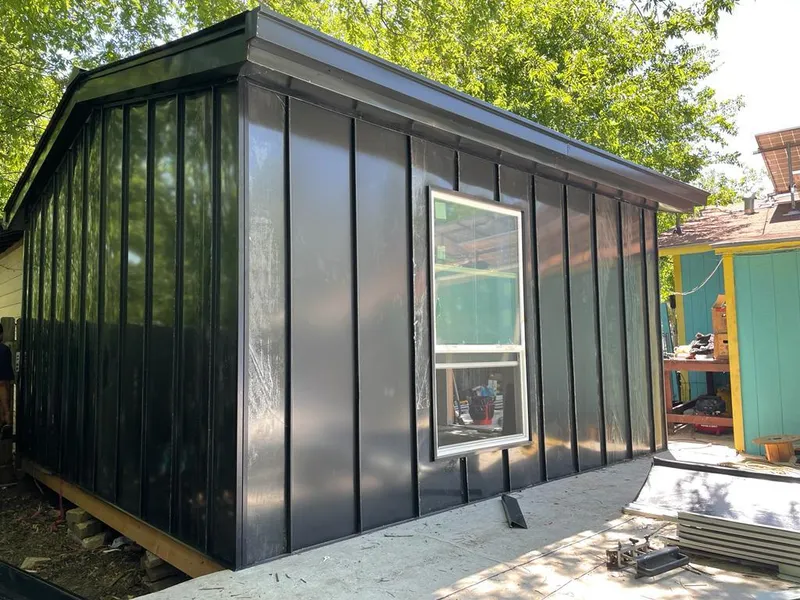 Black standing seam metal wall panels for Roof Inspection in Oak Ridge