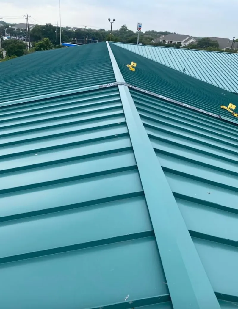 Green commercial metal roof ridge and valley for Metal Roof Repair in Oak Ridge